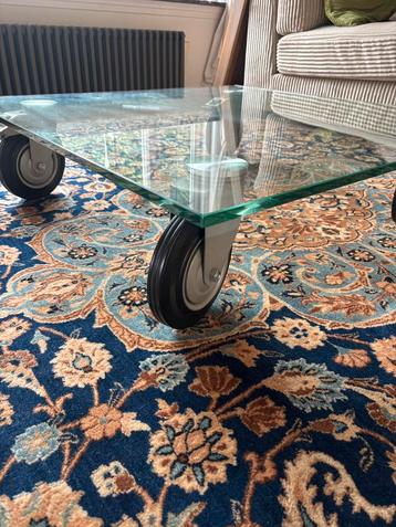 Grote salontafel, van glas en met eiken oplegblad beschikbaar voor biedingen