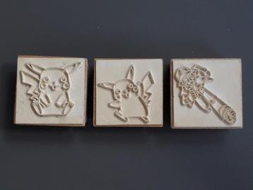 3 houten Pokémon stempels beschikbaar voor biedingen