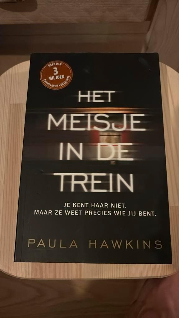 Paula Hawkins - Het meisje in de trein, Boeken, Thrillers, Zo goed als nieuw, Nederland, Ophalen of Verzenden