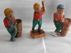 Set van drie houten beelden golf / golfers, Ophalen