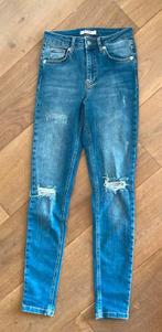 NA-KD midwaist destroyed skinny jeans maat 32 - XXS -176, Kleding | Dames, Spijkerbroeken en Jeans, Blauw, NA-KD, Ophalen of Verzenden