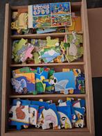 4 houten puzzels in een bak., Ophalen of Verzenden, 10 tot 50 stukjes, Zo goed als nieuw