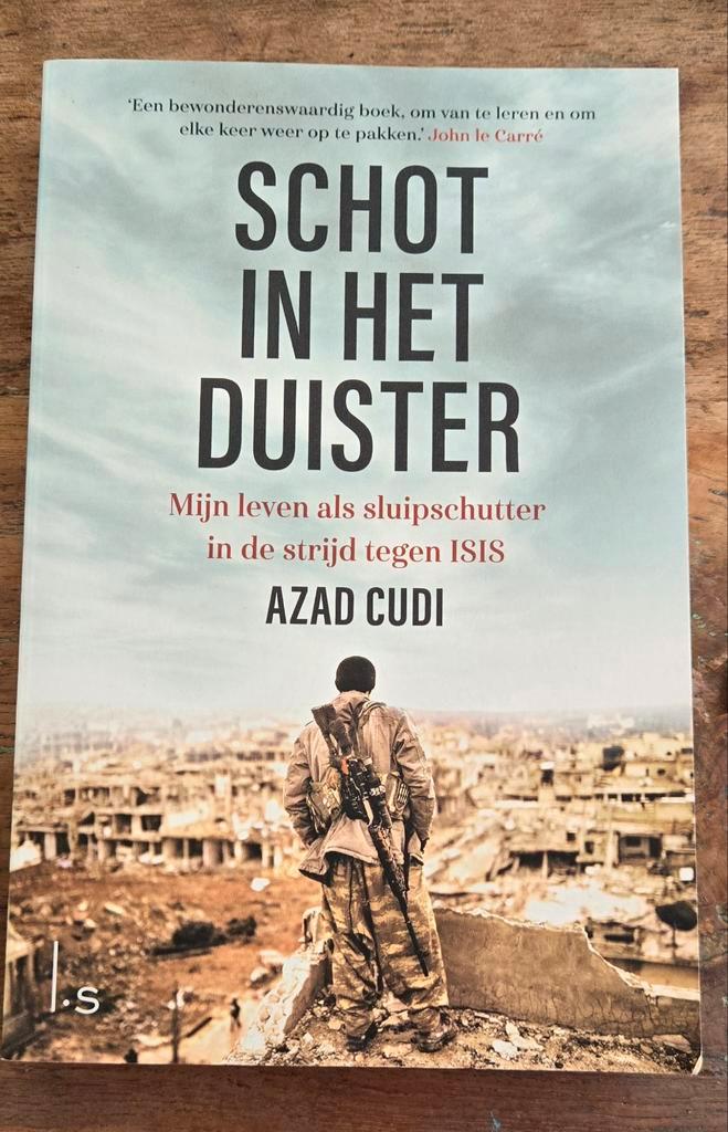 Azad Cudi - Schot in het duister, Boeken, Thrillers, Zo goed als nieuw, Ophalen of Verzenden