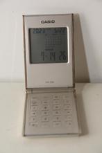 Vintage Casio Compact World Time Calculator FH-150, Diversen, Rekenmachines, Ophalen of Verzenden, Zo goed als nieuw
