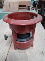 Petroleum brander met glas, Ophalen