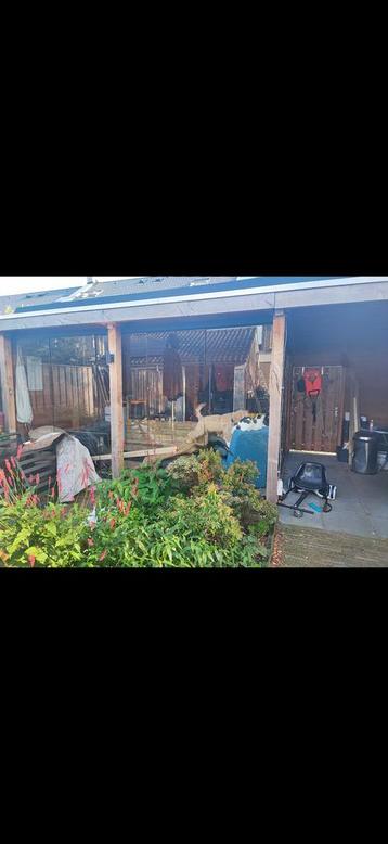 Gebruikte glazen schuifwand beschikbaar voor biedingen