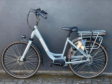 Vogue elektrische fiets zo goed als nieuw midden motor nexus beschikbaar voor biedingen
