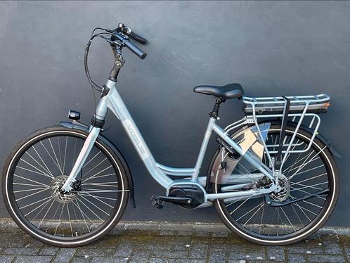 Vogue elektrische fiets zo goed als nieuw midden motor nexus, Fietsen en Brommers, Elektrische fietsen, Zo goed als nieuw, Overige merken