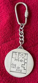 Zilveren hanger 12 mei dag van de zorg, Overige voorstellingen, Ophalen of Verzenden, Zo goed als nieuw, Zilver