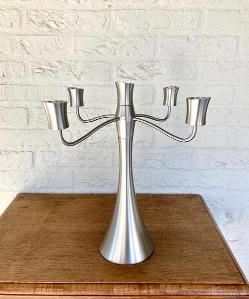 Puikdesign Amsterdam: Zilverstad 5 arms RVS kandelaar Monte., Huis en Inrichting, Woonaccessoires | Kandelaars en Kaarsen, Zo goed als nieuw
