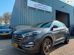 Hyundai Tucson 1.6 T-GDi Premium 4WD, Auto's, Lichtsensor, Gebruikt, 4 cilinders, Bruin