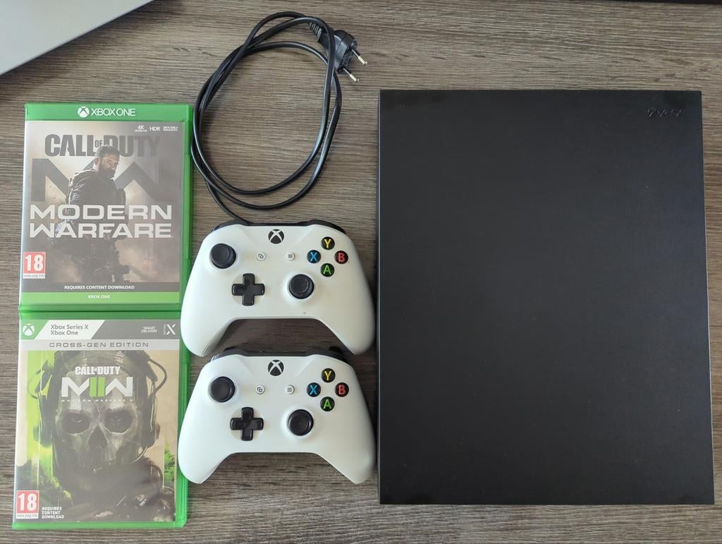 TE KOOP: XBOX ONE X + 2 Controllers + MW & MW2!, Spelcomputers en Games, Spelcomputers | Xbox One, Zo goed als nieuw, Xbox One X