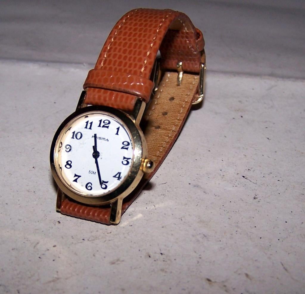 Mooi Prisma horloge. Izgs., Ophalen of Verzenden, Zo goed als nieuw