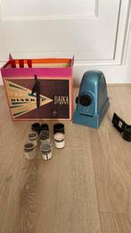 Diaskop met filmpjes, Ophalen