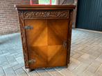 Anker naaimachine in kast, Ophalen