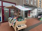 Zelfgemaakte marktkraam met aanhangwagen, Ophalen
