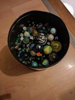 Grote blik knikkers, Ophalen, Gebruikt