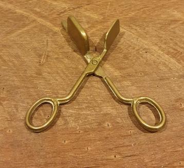 Oude messing kaarsendover / lontknipper beschikbaar voor biedingen