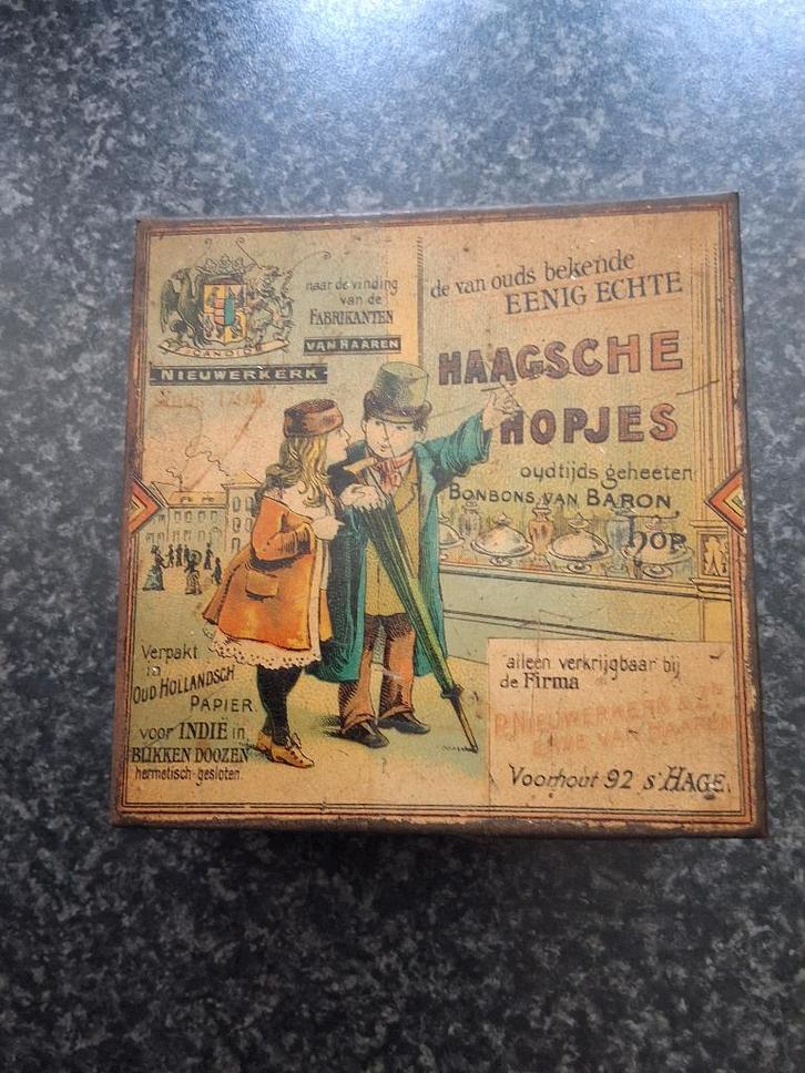 Antiek klein blikje HAAGSCHE HOPJES-NIEUWERKERK VAN HAAREN, Verzamelen, Blikken, Gebruikt, Koek(jes), Ophalen of Verzenden