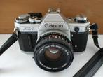 Canon AE-1 reflexcamera met Canon FD 50mm F/1.8 S.C. lens, Audio, Tv en Foto, Fotocamera's Analoog, Ophalen of Verzenden, Niet werkend
