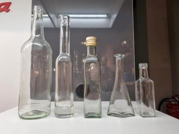 Grote hoeveelheid glazen flessen  beschikbaar voor biedingen