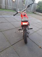 Rode mini crosser 49 cc, Fietsen en Brommers, Minibikes, Midibikes en Pitbikes, Ophalen of Verzenden, Zo goed als nieuw, 49 cc