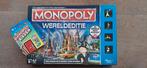 Monopoly Wereldeditie+ gratis kaartspel Monopoly Bieden, Hobby en Vrije tijd, Ophalen of Verzenden, Zo goed als nieuw