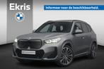 BMW iX1 eDrive20 M Sportpakket 20'' / Harman Kardon / Panora, Auto's, BMW, Parkeersensor, Stof, Gebruikt, Met garantie (alle)