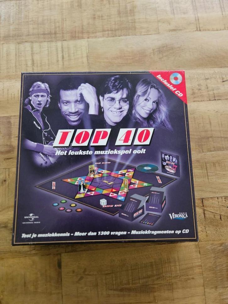 Bordspel Top 40 muziekspel, Hobby en Vrije tijd, Gezelschapsspellen | Bordspellen, Zo goed als nieuw, Een of twee spelers, Drie of vier spelers