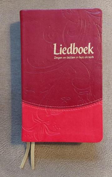 Liedboek zingen en bidden in huis en kerk  (rood kunstleer) beschikbaar voor biedingen