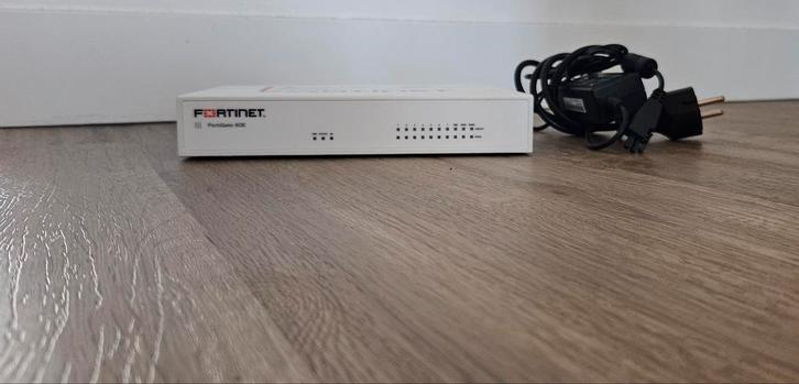 Fortinet Fortigate 60E Firewall/Router, Computers en Software, Routers en Modems, Gebruikt, Router met modem, Ophalen of Verzenden