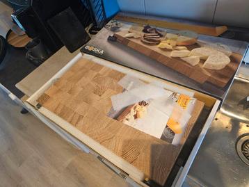 Boska manhattan kaas en broodplank beschikbaar voor biedingen