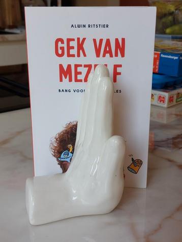 Porseleinen boekensteun in de vorm van een hand beschikbaar voor biedingen