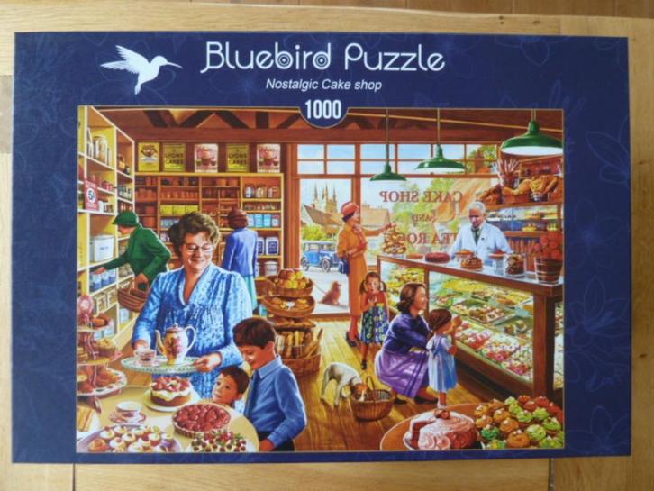 Bluebird puzzel 1000 stukjes Nostalgic cake shop, Hobby en Vrije tijd, Denksport en Puzzels, Zo goed als nieuw, Legpuzzel, 500 t/m 1500 stukjes