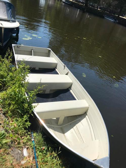 Keurig onderhouden aluminium sloep & elektrische motor, Watersport en Boten, Sloepen, Zo goed als nieuw, 50 tot 70 pk, 3 tot 6 meter