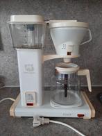 DE koffie machine, Ophalen