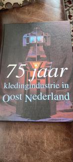 75 jaar kledingindustrie in Oost Nederland, Ophalen of Verzenden, Zo goed als nieuw