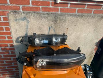 Koplampen mitsubishi galant 1997 tm 2004. beschikbaar voor biedingen