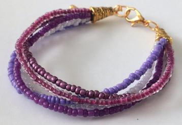 Armband met 5 laagjes in mooie paarse /roze tinten beschikbaar voor biedingen