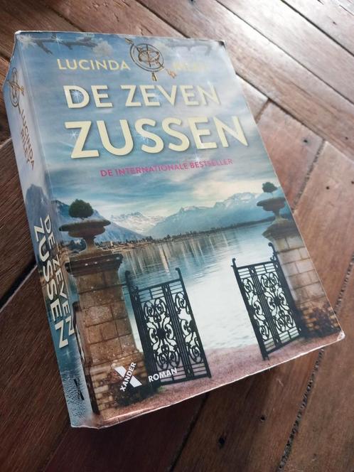 Lucinda Riley - De zeven zussen, Boeken, Literatuur, Zo goed als nieuw, Nederland, Ophalen of Verzenden
