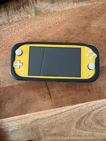 Nintendo Switch Lite + Accessoires + Spel  beschikbaar voor biedingen