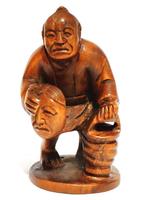 Boxwood Netsuke van een masker verkoper - Japan, Antiek en Kunst, Ophalen of Verzenden