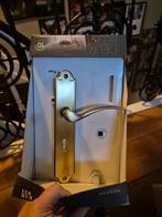 Deurklink Jorge ovaal schild sleutelgat 56mm messing antiek, Ophalen, Nieuw