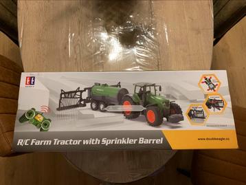 Rc Farm Tractor met sprinkler tank bij schaal 1/16 in doos beschikbaar voor biedingen