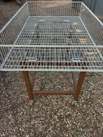 Stalen winkel manden, Ophalen