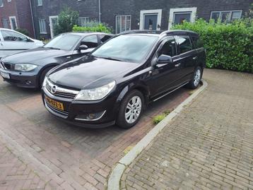 Opel Astra 1.6 16V 85KW SW 2009 Zwart Cosmo