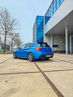 BMW 1-Serie 3.0 M135i 5DR Xdrive AUT 2014 estoril blau, Auto's, BMW, Euro 6, Alcantara, Vierwielaandrijving, Particulier