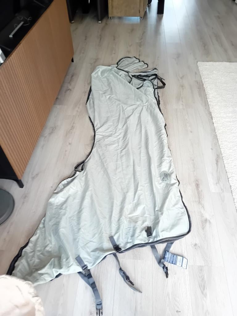 Vliegendeken met zadeluitsparing voor buitenritten, Ophalen