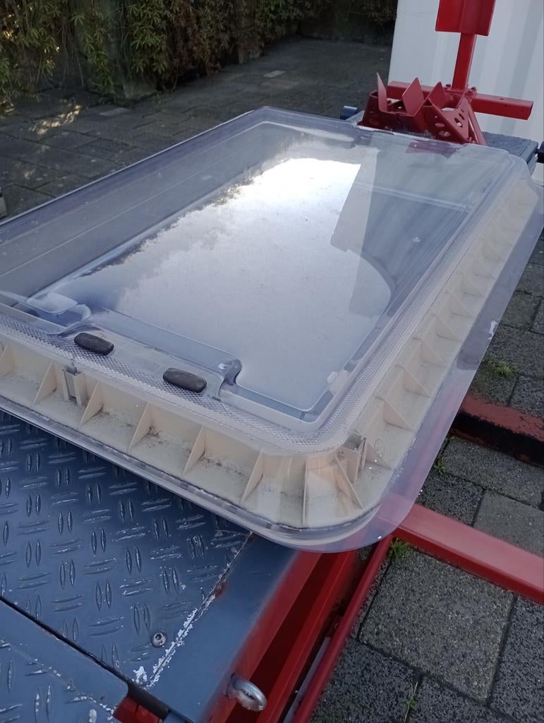 Dometic dakluik dakraam, Ophalen