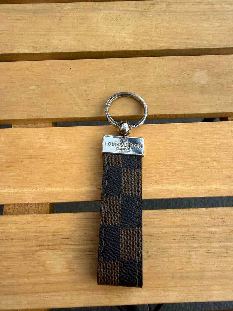 Louis vuitton - sleutelhanger Bruin, Verzamelen, Sleutelhangers, Ophalen of Verzenden, Gebruikt, Merk